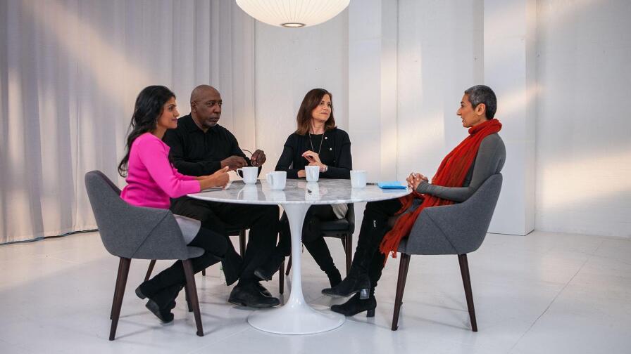 People at a table, from the episode "Is Patriarchy On Its Way Out"