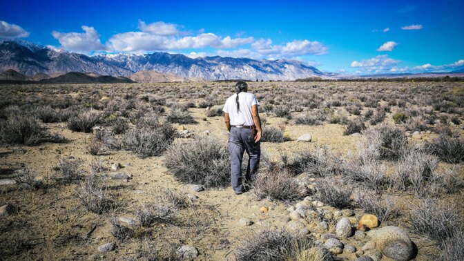 Paiute elder Harry Williams at irrigation ditch