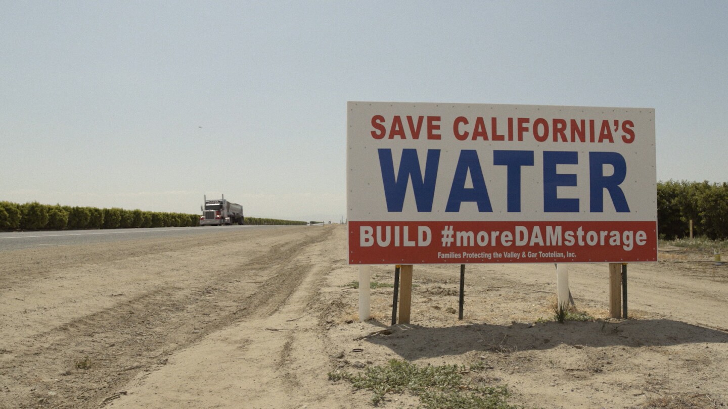 A sign by the side of the freeway in California asks drivers to "Save California's Water" | Still from Tending Nature