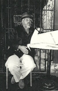 Richard Fulton sitting outside 5th St. Dicks Coffee House