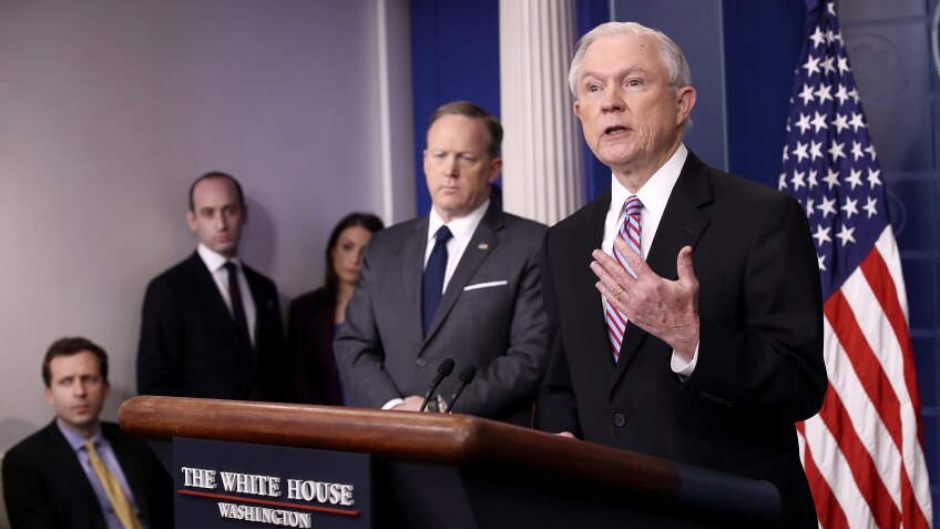 Attorney General Jeff Sessions announced new actions against sanctuary cities that seek Justice Department grants during his surprise appearance at a briefing from White House press secretary Sean Spicer. | Photo by Win McNamee/Getty Images)
