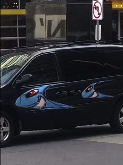 A black van bombed with two torpedo-like figures by Kenny Scharf for his "Karbombz!" project | Courtesy of the artist