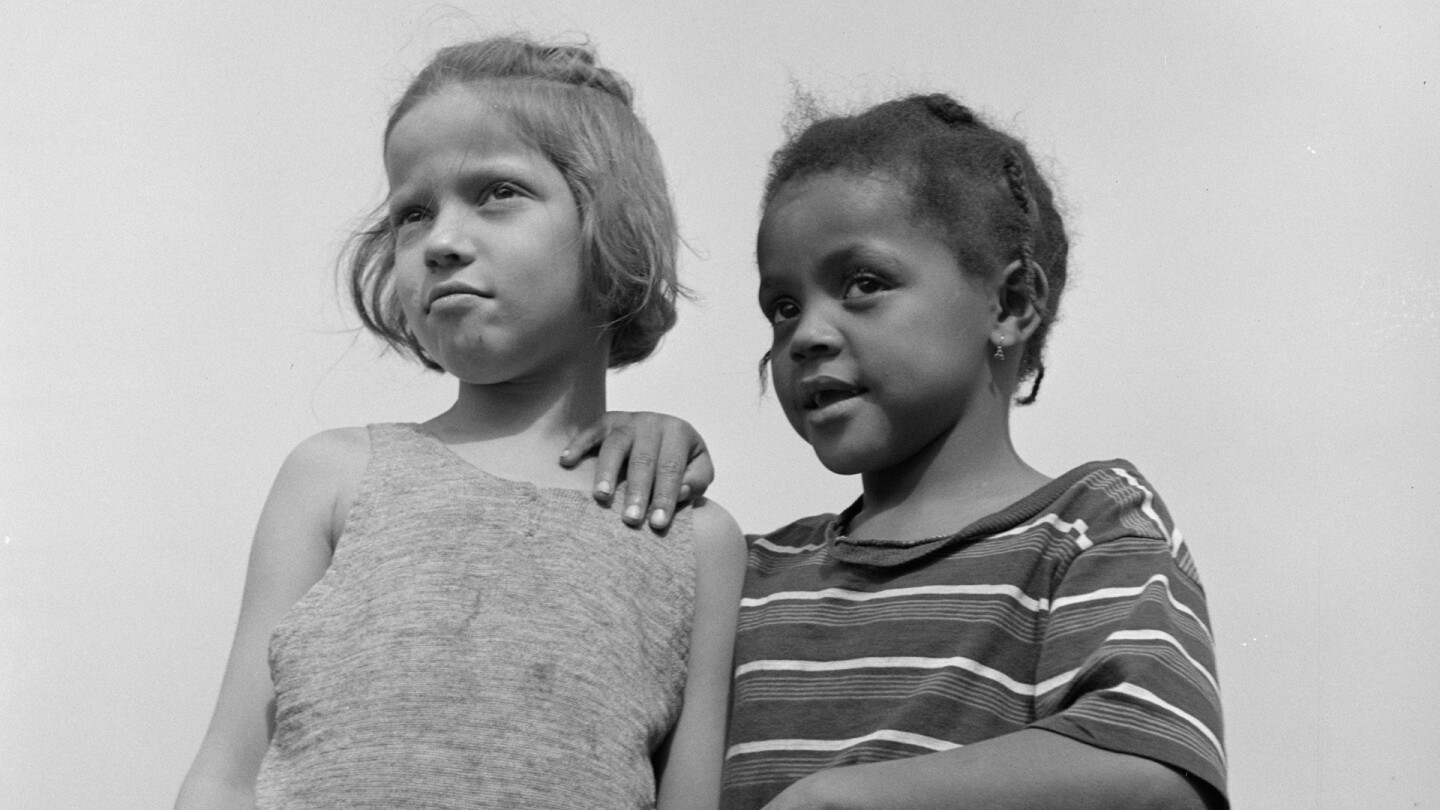 Two children at Camp Christmas Seals in Haverston, New York, 1943, featured in POWER & HEALTH. (Image courtesy of Gordon Parks)