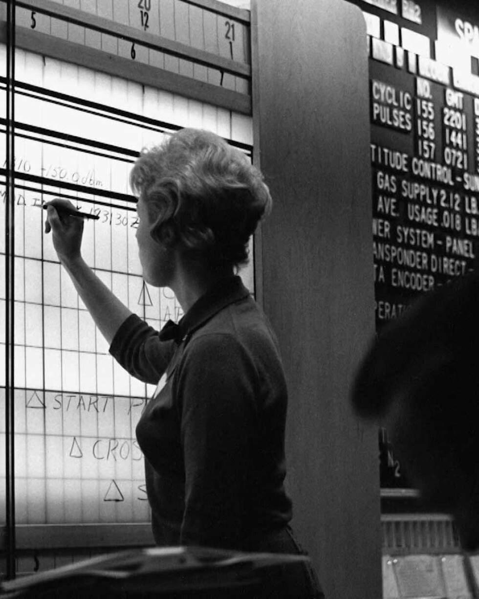 Sue Finley making calculations on the board. | Still from “Blue Sky Metropolis” Episode 4