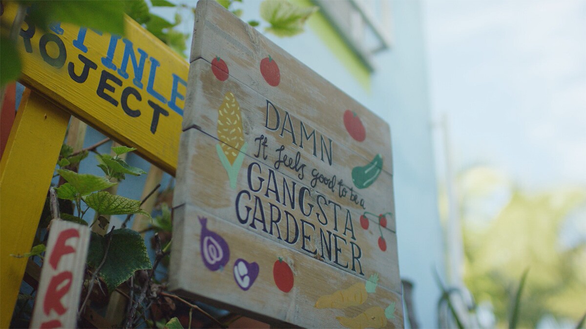 Ron Finley's signage at his garden. | Still from "Broken Bread" Access