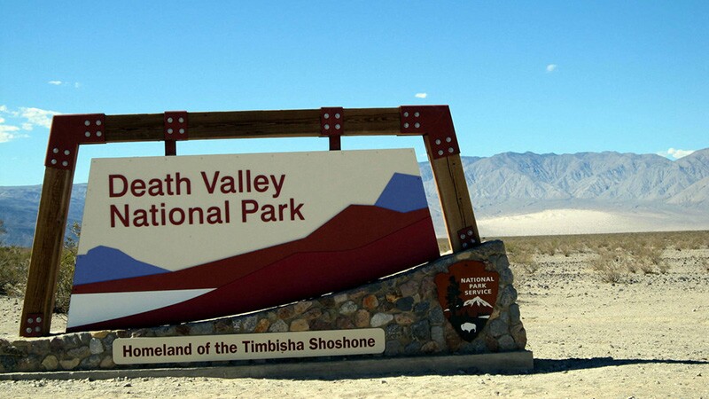 Death Valley NP sign with Timbisha Homeland banner