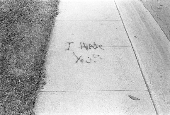 John Divola, San Fernando Valley (I hate you), 1971 / Gelatin silver photograph, 14 in. x 18 in. | Courtesy of CSUN.