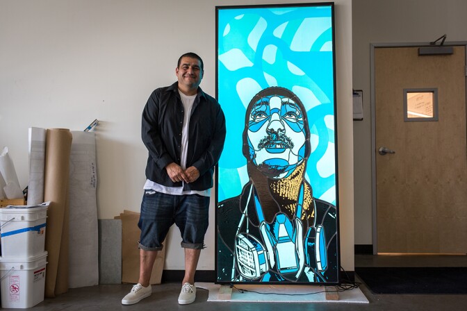 David Flores with finished work | Courtesy of Judson Studios