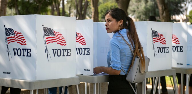 Destiny Martinez, 18, votes for the first time at the Power California early voting event and festival for students of the Los Angeles Unified School District on Wednesday, October 24, 2018 in Norwalk. | Mindy Schauer/Digital First Media/OC Register
