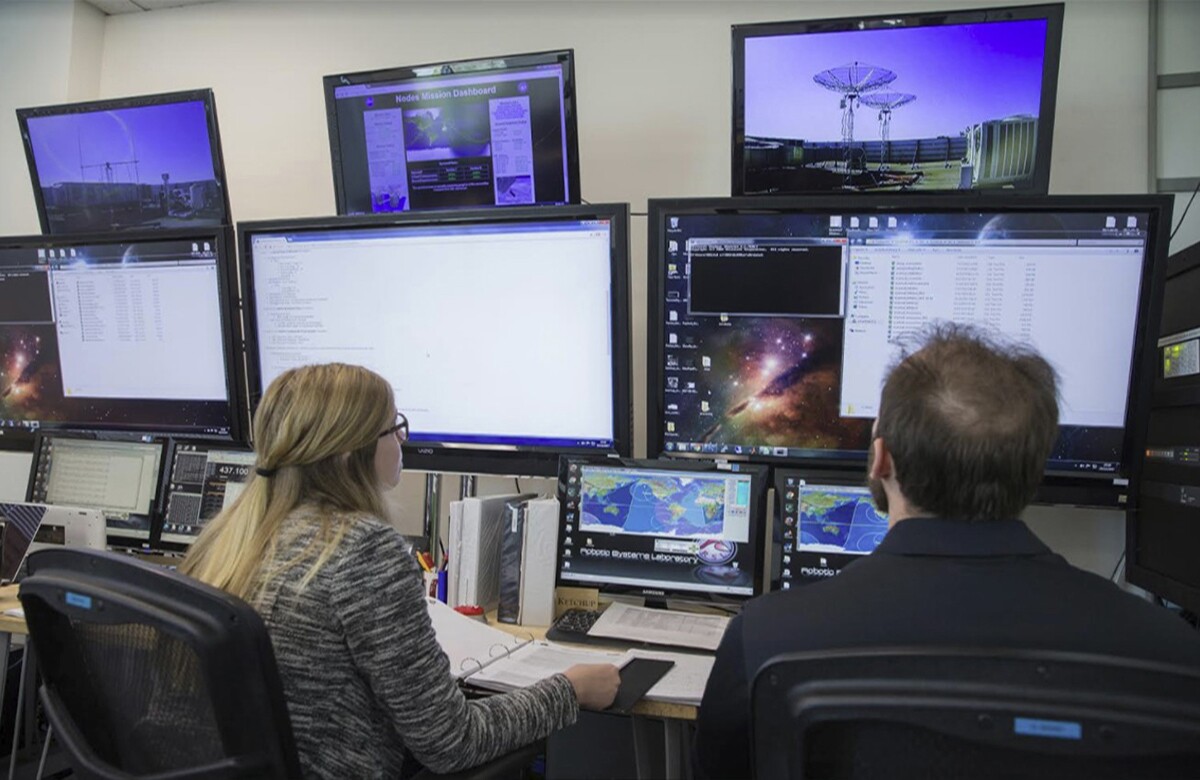 Kayleigh Dobson and recent graduate Leland Taylor in the mission control room at the Robotic Systems Laboratory. | Courtesy of Christopher Kitts