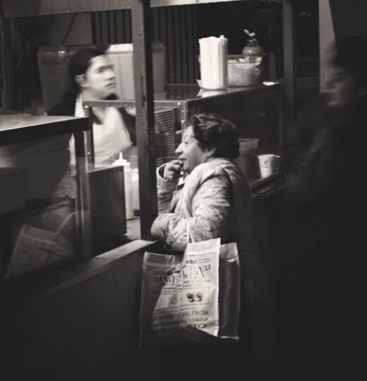 "Woman Ordering Food," 2008 © Kevin McCollister