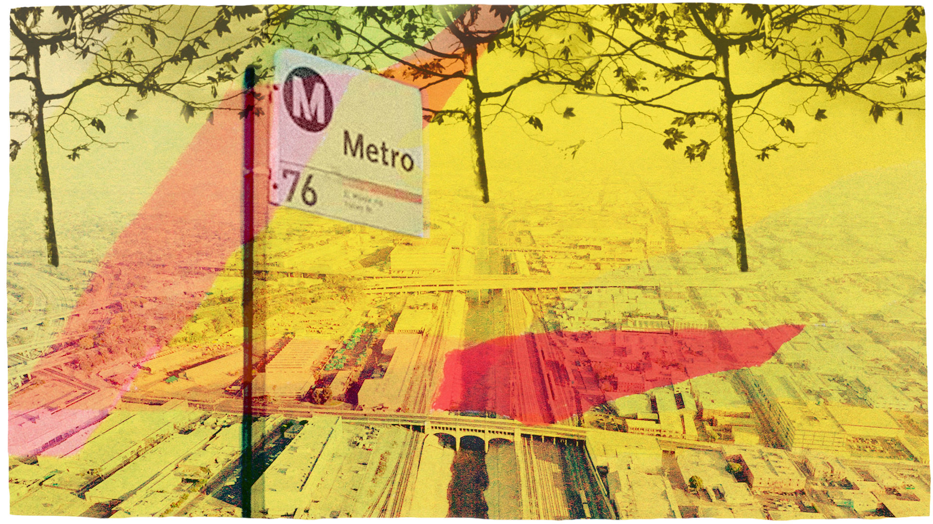 Metro bus stop sign against the Los Angeles cityscape