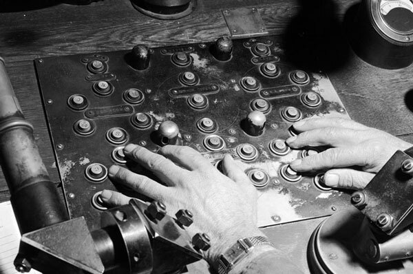 Close-up view of a Mount Wilson telescope operator at the controls. Courtesy of the Los Angeles Examiner Collection, USC Libraries.