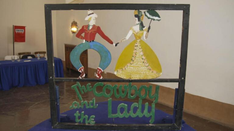 Appraisal: 'The Cowboy and the Lady' Painted Sculpture