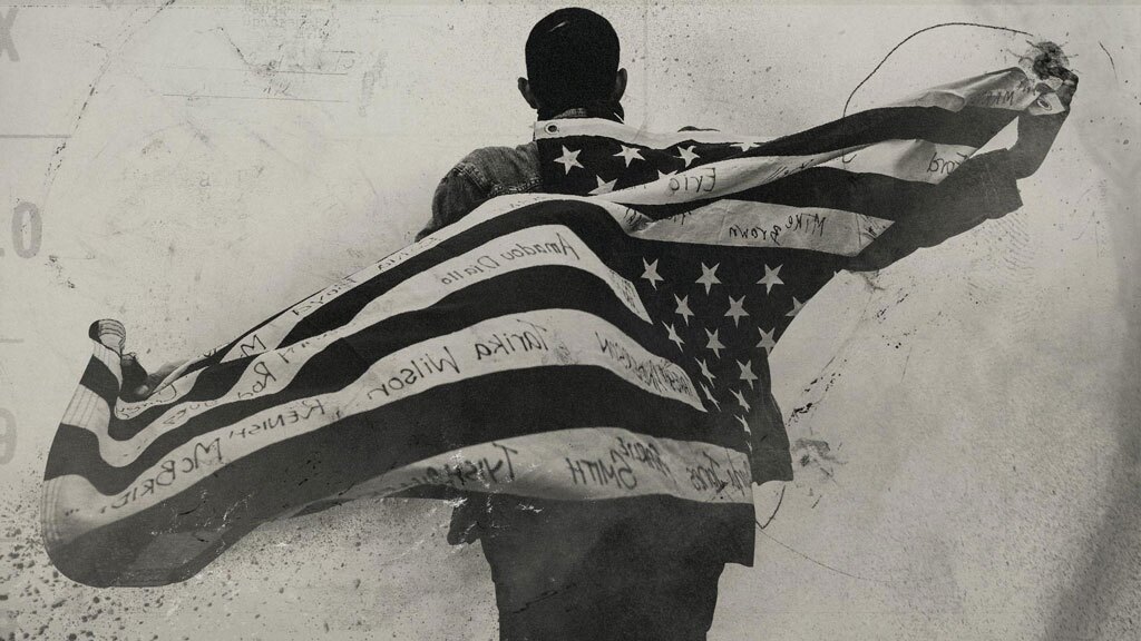 An illustration of a man holding the American flag behind his back. | From "The Talk: Race in America"