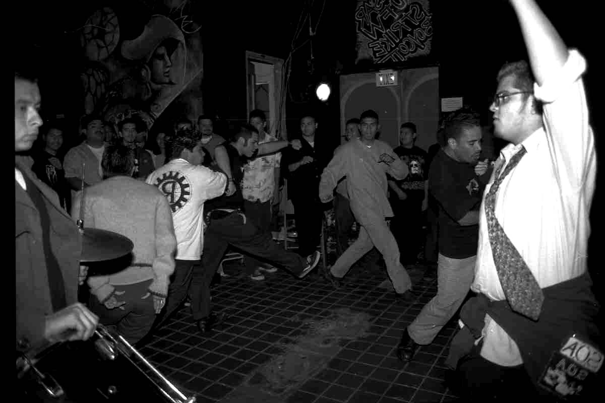 A gig, Aztlan Cultural Arts Foundation, black and white photo, 1999 | Sandra de la Loza