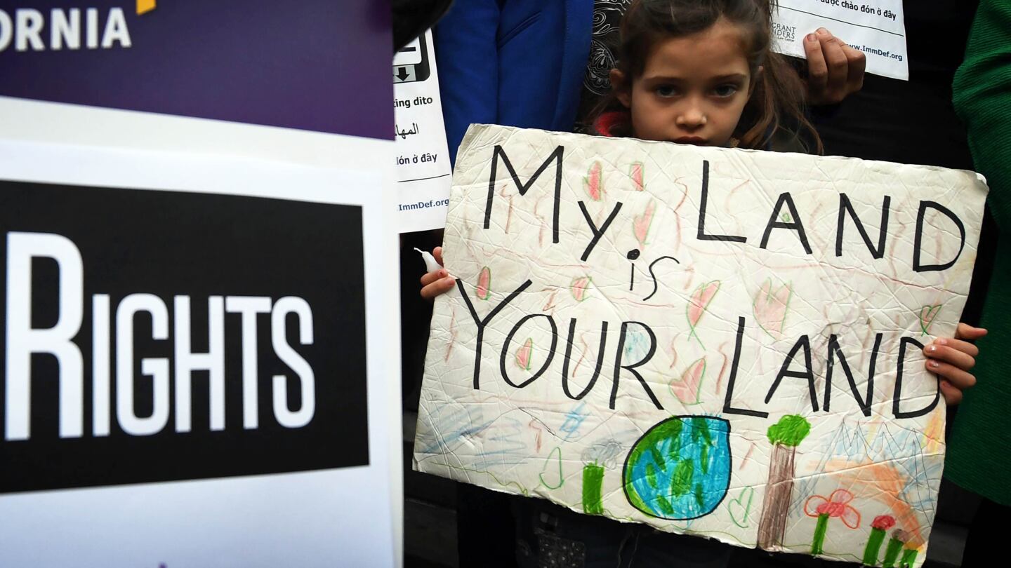 Maya Casillas, 7, joins migrant rights group during a protest against Pres. Trump's new immigration policies outside L.A. City Hall, Jan. 25, 2017 | photo MarkRalston/AFP/Getty Images