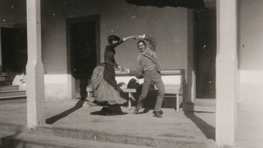 Charles Lummis dancing with woman