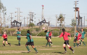 Youth soccer in the Baldwin Hills alongside active oil fields