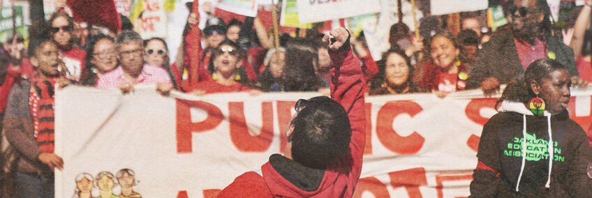 People marching during the Oakland teacher strike. | Image from "City Rising: Youth & Democracy"
