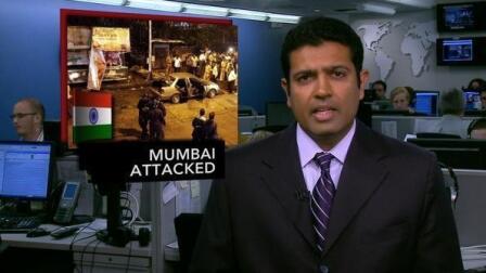News Wrap: Mumbai Bombings Kill at Least 21, Wound More...