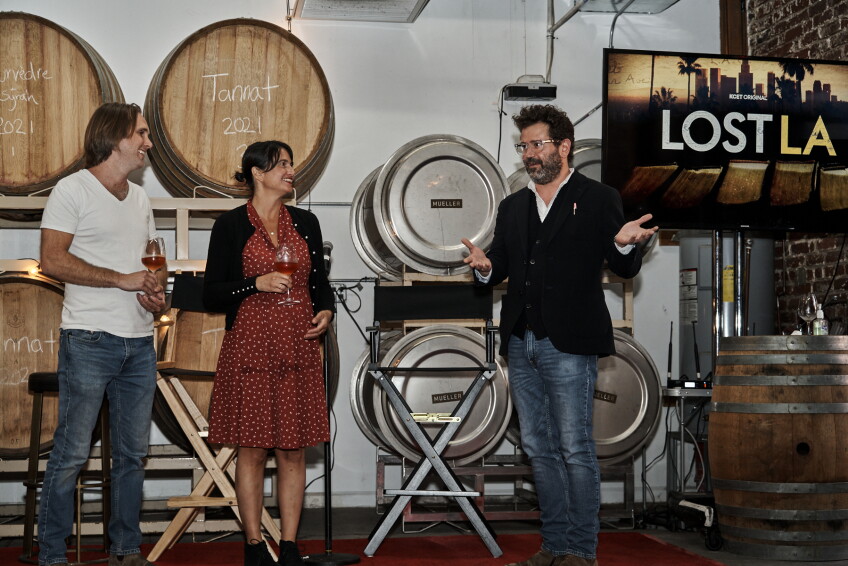 (Left to Right) Angeleno Wine Company's Jasper Dickson and Amy Luftig Viste with KCET CCO Juan Devis welcome attendees at KCET's LOST LA event at Angeleno Wine Company on Mar. 29, 2022. Photo courtesy of KCET.