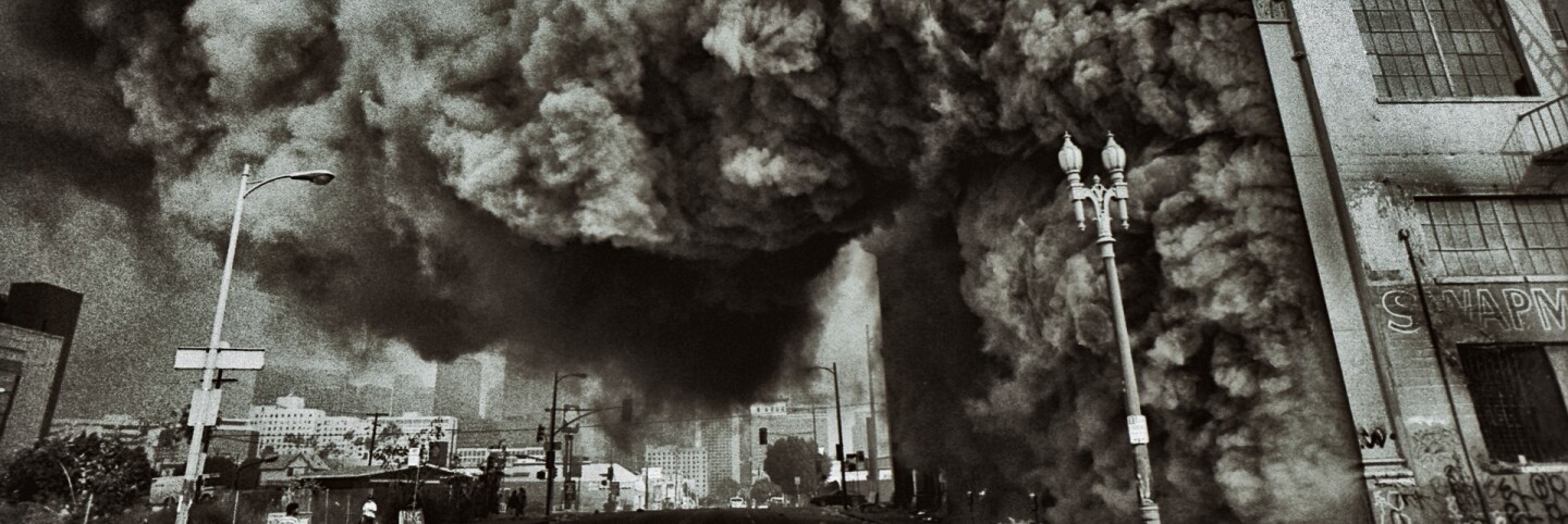 A large building housing a swap meet mall on fire at 7th Street and Union Ave in Pico/Union. LA Riots | Ted Soqui