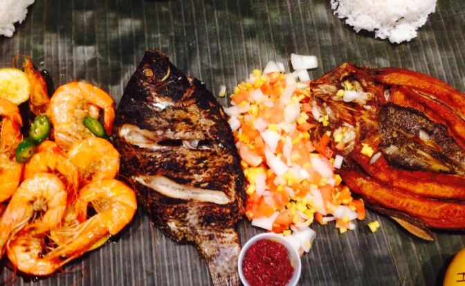 Kamayan dining with grilled fish, boneless milkfish and mango salsa | Daniel Belen