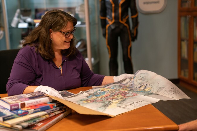 Rebecca Cline unfolds the hand-drawn sketch that started the Disneyland | Katie Noonan