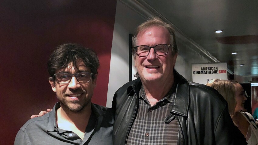 Director Alfonso Gómez-Rejón and KCET Cinema Series host Pete Hammond in the lobby of the Aero Theatre