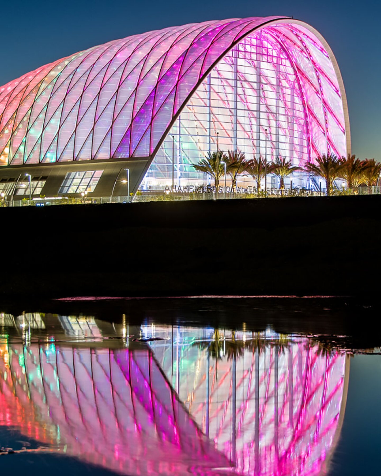 Outdoor evening shot of the Anaheim Regional Transportation Intermodal Center overlooking the Santa Ana River.