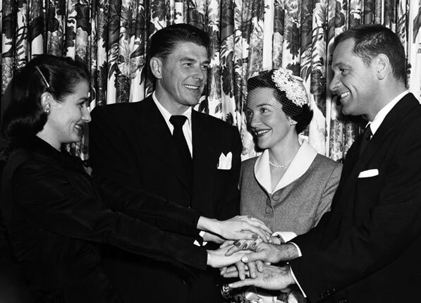 Reagan marrying Nancy Davis in 1951. Actor William Holden, his best man, appears on the right. Courtesy of the Los Angeles Examiner Collection, USC Libraries.