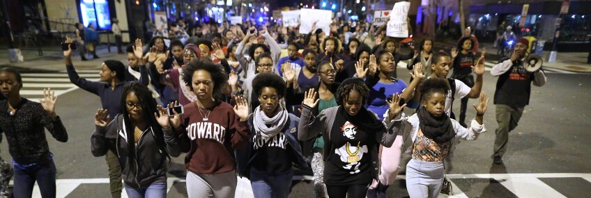 Hundreds of demonstrators, many of them Howard University students, march down the middle of U Street Northwest after a grand jury did not indict the white police officer who killed an unarmed black teenager | Chip Somodevilla/Getty Images