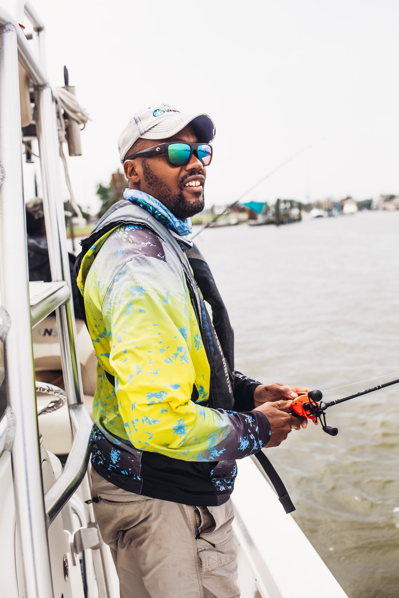 Captain Fred fishes off his boat, the NauticStar.