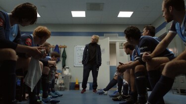 Helena speaks to her players in the locker room. | "Home Ground: Supporters" Preview