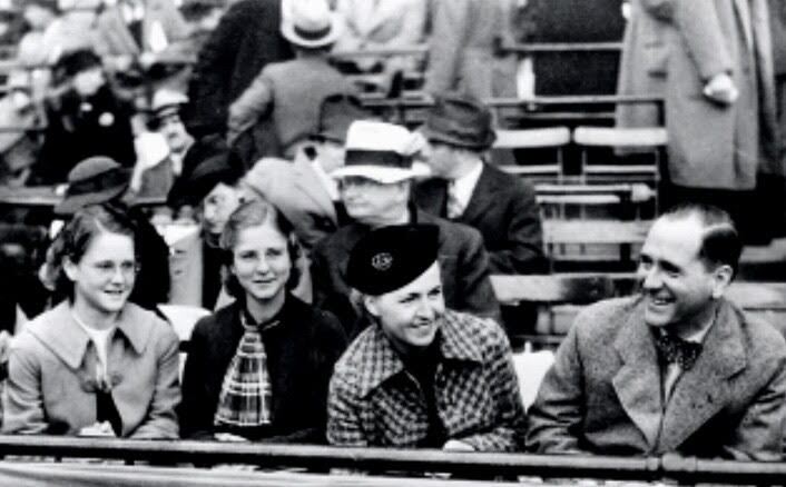 Harry Bennett sits alongside family members Aunt Trudy, his daughter Billie and his wife Esther at a race event.