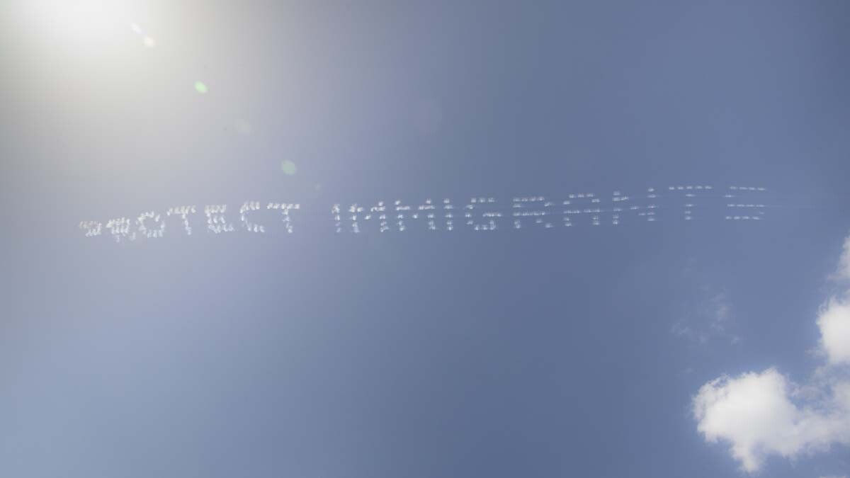 "PROTECT IMMIGRANTS" written in in the sky, contributed by Karen Y. Martinez over ICE Houston Field Office | Brenda Edith Franco, In Plain Sight