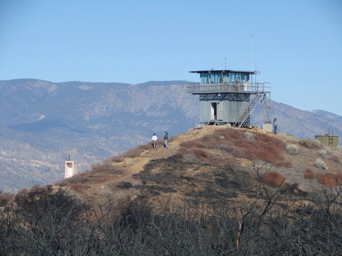 Visitors wander the trails leading up to the Slide Mountain lookout tower in Castaic, CA.