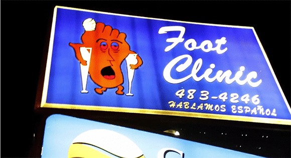 The Ever Rotating Happy Foot / Sad Foot Sign