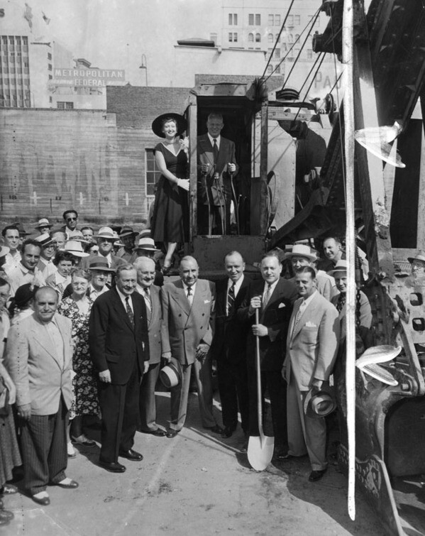 Assembled dignitaries, including Governor Earl Warren (at the controls of the shovel) at the groundbreaking ceremony for the Hotel Statler in 1950. Courtesy of the Herald-Examiner Collection, Los Angeles Public Library.