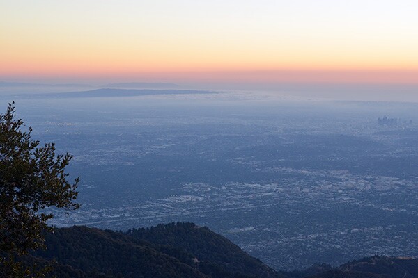 The view from atop Mount Wilson. Catalina Island can be seen top left, and the downtown Los Angeles skyline is visible far right. The entire city of Pasadena is visible in the lower half of the picture. | Photo: Elson Trinidad