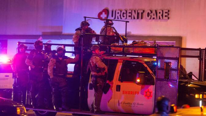 A large number of Los Angeles County Sheriff’s deputies converged on the area surrounding St. Francis Medical Center after reports of protesters on the property on Saturday, Sept. 12, 2020. | Jason Armond / Los Angeles Times via Getty Images