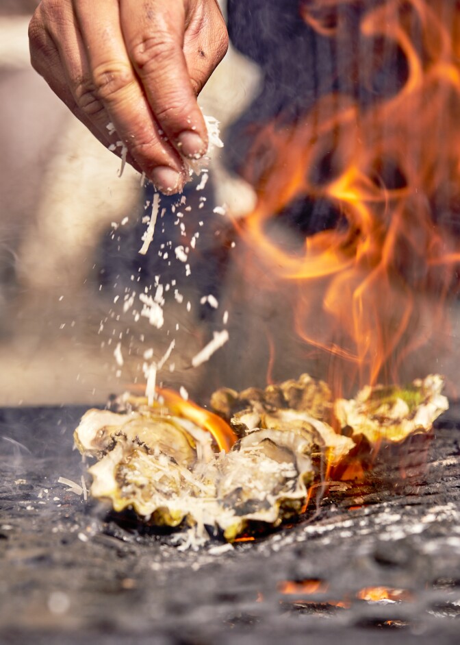 Oysters on the grill at the Manila District in downtown Los Angeles.