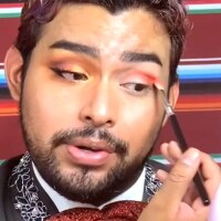 Ayan does their makeup. | Still from "Makeup and Mariachi with Ayan"