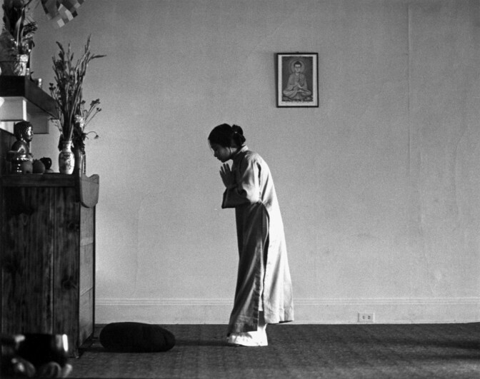 Woman Praying at the Vietnamese Buddhist Temple, Los Angeles by Don Farber, 1977 | Don Farber