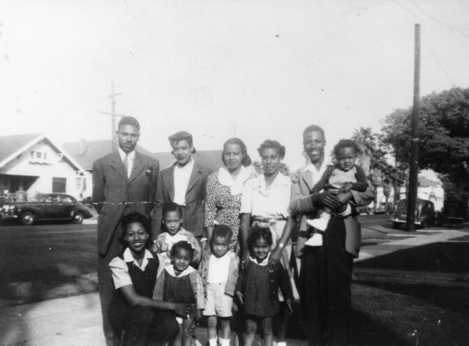 The Lee family in front yard of home near Central Avenue and 21st Street.