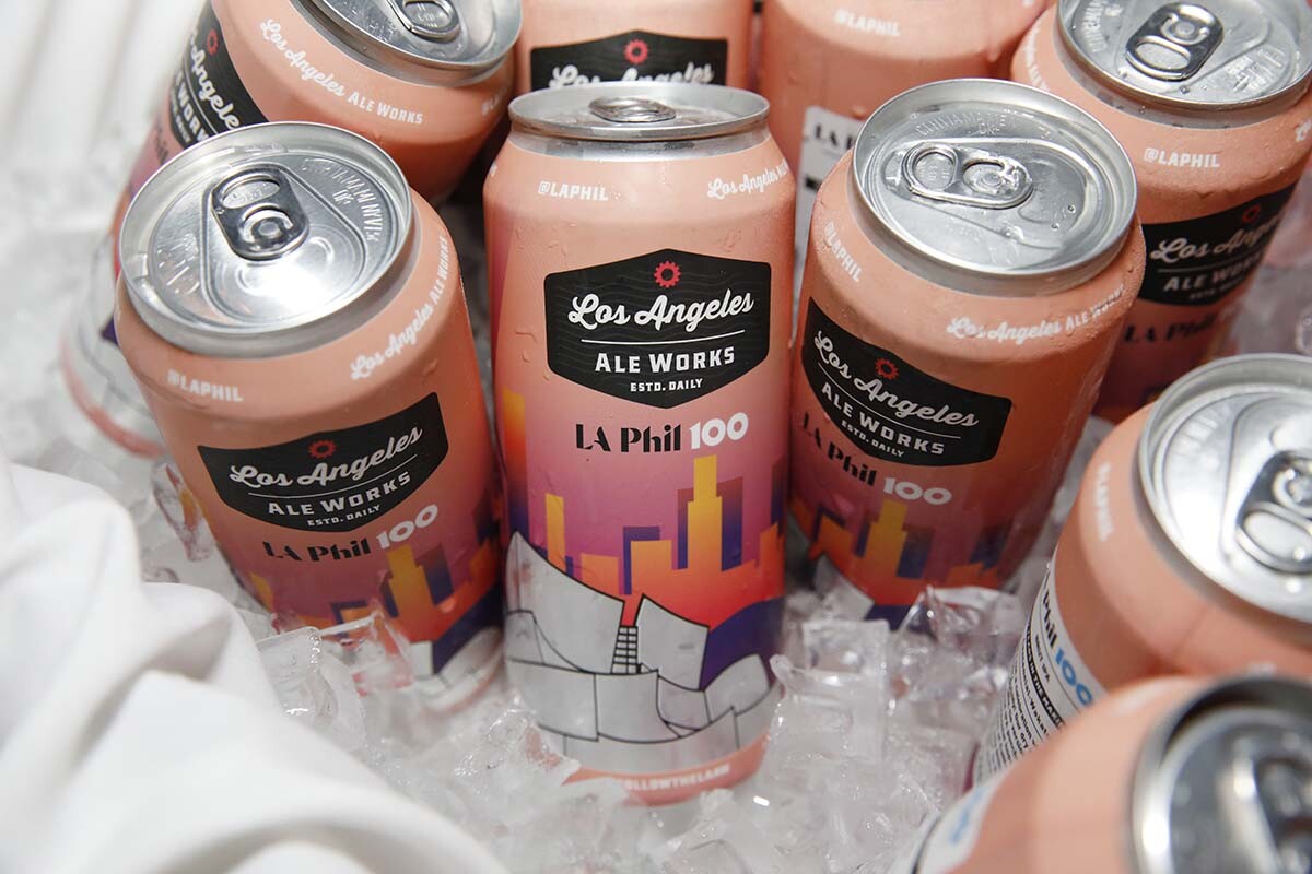 A cluster of LA Phil 100 Brut IPAs on ice from Los Angeles Ale Works | Courtesy of LA Phil