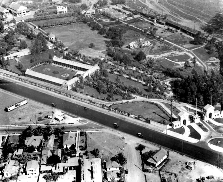 A black and white aerial view of Luna Park, several acres of green space, with winding walkways carving through the different attractions.