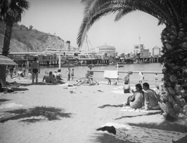 Sunbathing on the beach by the harbor, ca. 1938 | Herman J. Schultheis Collection, Los Angeles Public Library