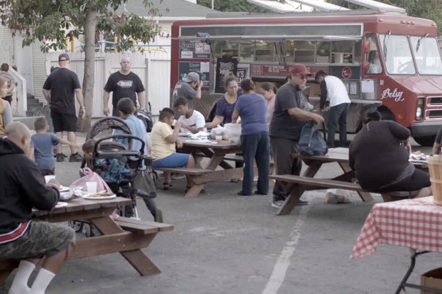 Serving food from Bracken's Kitchen | Still from "Broken Bread"